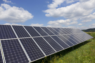 Solar Power Station on the summer flowering Meadow 