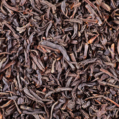 Dry black tea leaves