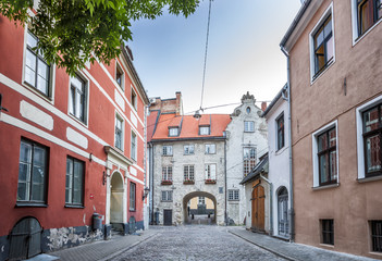 Fototapeta na wymiar The Swedish Gate In Riga old Town. It's only remaining gate of city medieval defence wall. Panoramic montage of 3 HDR image