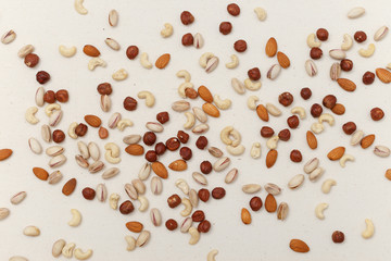 Composition of nuts pattern - mix hazelnuts, cashews, almonds, pistachios.
