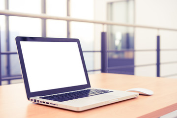 Fototapeta premium Laptop blank screen in the library and office