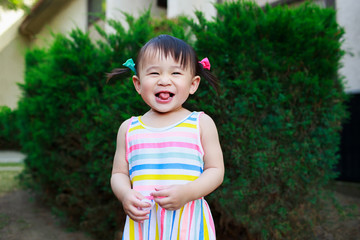 Toddler girl playing outdoor