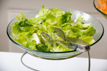fresh organic lettuce in a glass bowl