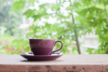 Purple coffee cup on tabletop