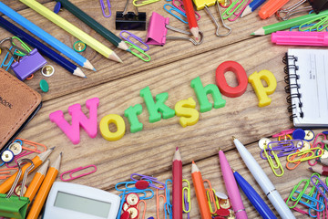 Workshop word and office tools on wooden table