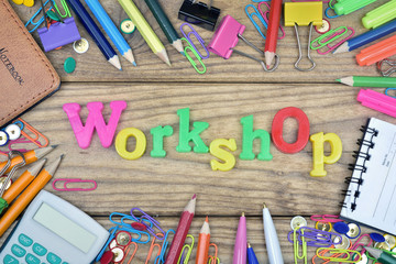 Workshop word and office tools on wooden table