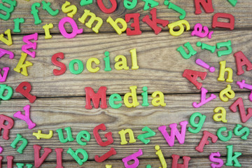 Social Media on wooden table