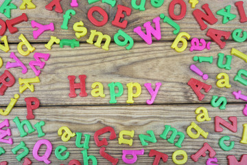 Happy on wooden table
