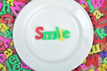 Smile word on plate