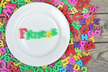 Fitness word on plate
