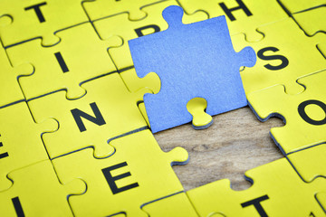 Puzzle on wooden table