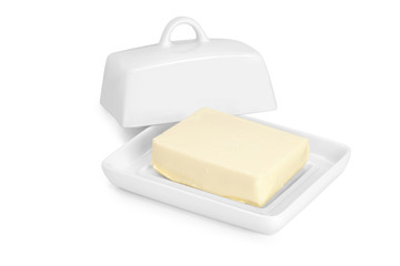 butter in white ceramic butter-dish on white background