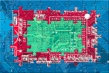 Electronic circuit puzzle background in blue, red and green colo