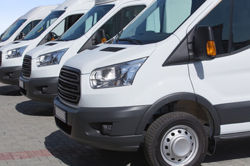 minibuses and vans outside © Yuri Bizgaimer