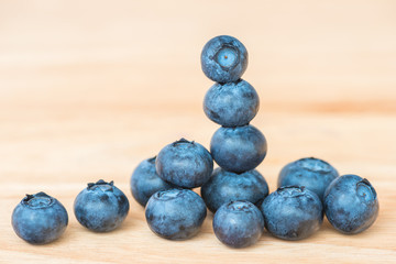Blueberry on wooden table background