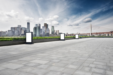 empty floor with cityscape and skyline of chongqing in clous sky