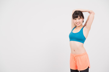 Fototapeta premium スポーツウェアで運動をする女性