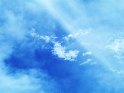 blue sky with Stratus, Stratocumulus, and Cumulus clouds