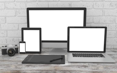Fototapeta premium Responsive mockup screen. Monitor, laptop, tablet, phone on table in office. 3d rendering.
