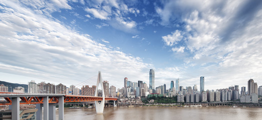 cityscape and skyline downtown near bridge of chongqing in cloud