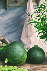 Round zucchini on rustic table