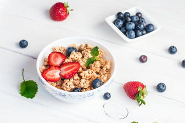 healthy breakfast with muesli and berries