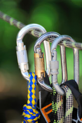 Climbing sports image of a carabiner on a rope