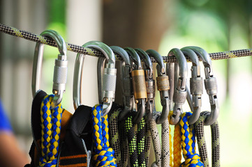 Climbing sports image of a carabiner on a rope