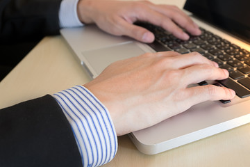 businessman hand typing