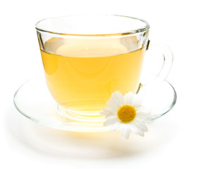 Cup of green tea with chamomile flower