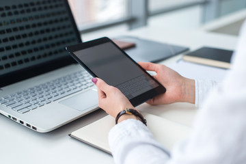 Woman working from home in her office.