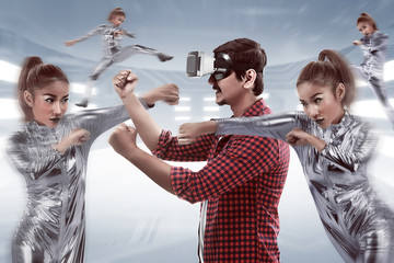 Young asian man using VR headset