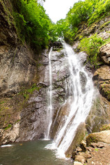 Fototapeta na wymiar waterfall in the mountains of Adjara
