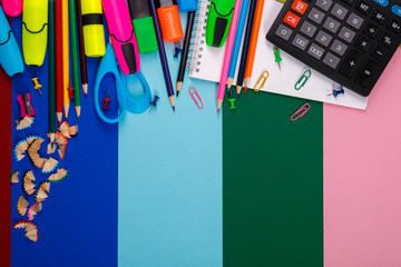 School or office stationery on colorful background. Back to School. Frame, copy space. Top view....