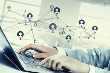 Woman typing on keyboard . Mixed media