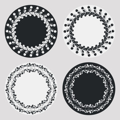 Set of silhouette round frames with floral elements. Design element for  logo, banners, labels, prints, posters, web, presentation, invitations, weddings, greeting cards, albums. Vector clip art.