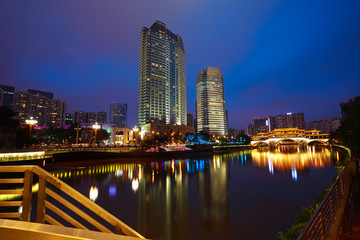 Fototapeta na wymiar Rivers with city modern architecture background Night