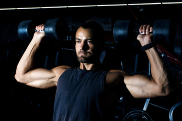 Fototapeta na wymiar one caucasian man exercising weight training workout fitness in