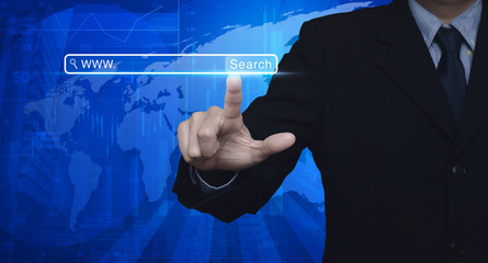 Businessman hand pressing search www button over map and city to