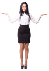 Cheerful young business lady makes a scales gesture. She offers you to make a choice. White background isolated. Full length cutout portrait.