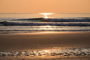 Fototapeta na wymiar Golden beach sunrise morning at hua hin