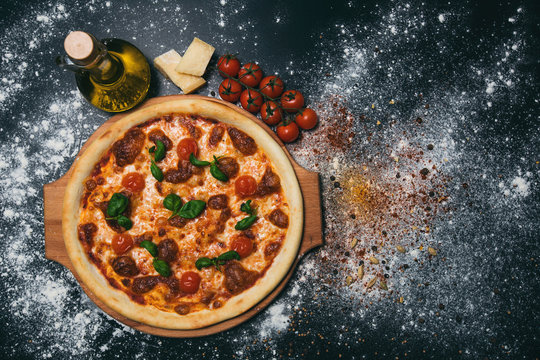Tasty pizza on black background