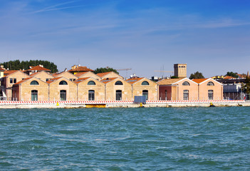 Obraz premium Venice, Italy. Ancient industrial buildings on the bank of the channel...