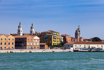 Fototapeta na wymiar Venice. Italy. Bright ancient buildings ashore Canal Grande..
