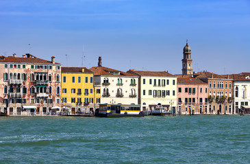 Naklejka premium Venice. Italy. Bright ancient houses lengthways Canal Grande..