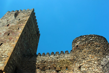 Restored renovated ancient ruins and walls of medieval Georgian fortress in Ananuri, Georgia © aquatarkus