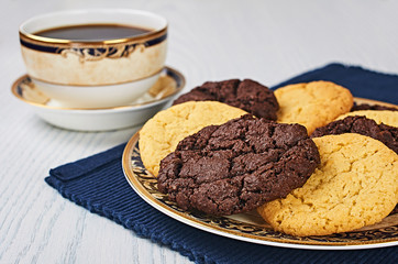 Old-Fashioned Sugar and Double Chocolate Cookies With Coffee on a White Wooden Table