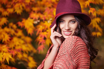 Portrait of a autumn woman on leafs