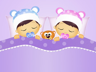 babies sleeping in the bed