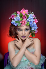 Naklejka premium Studio shot of a good looking young woman wearing white attire a